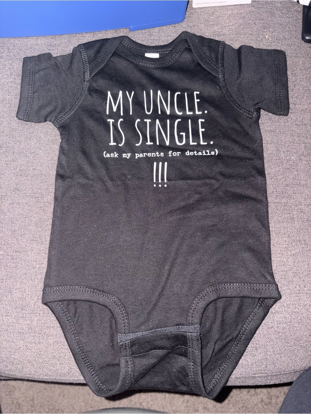 Black Baby One-Piece Bodysuit - "My Uncle Is Single"
